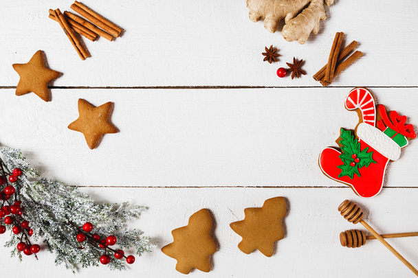 Christmas cookies on wooden table - Foto, afbeelding