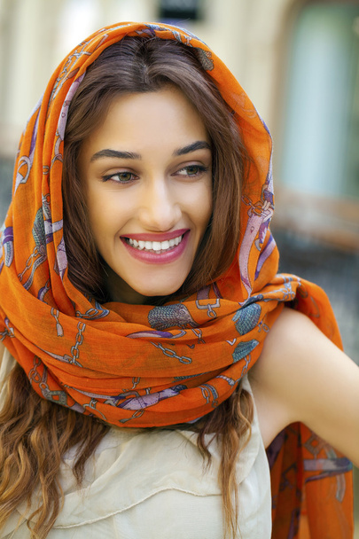 Close up portrait of a muslim young woman wearing a head scarf - Фото, зображення
