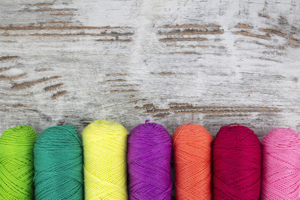 Colorful sewing threads background - Photo, image