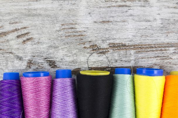Colorful sewing coils background - Photo, image