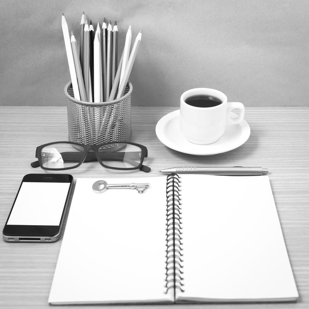 office desk : coffee and phone with key,eyeglasses,notepad,penci - Zdjęcie, obraz