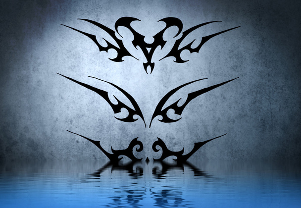 Black tribal armband with water reflection. Tattoo design over b - Photo, image