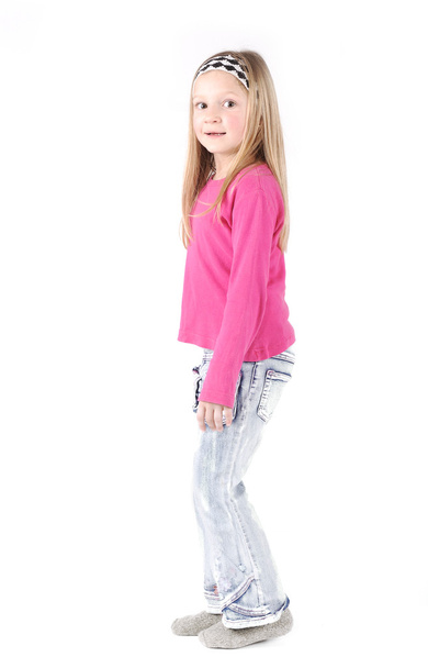 Cute little girl standing in studio - Fotografie, Obrázek