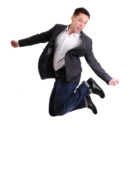 Full length of business man jumping in joy - Foto, afbeelding