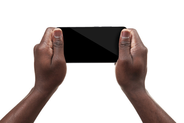 Male hands holding a smartphone - Foto, Imagem