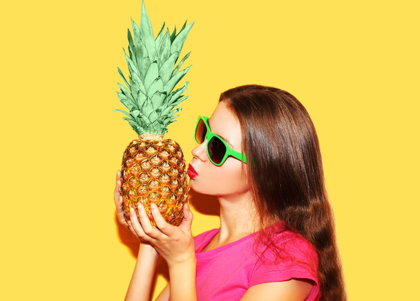 Fashion portrait woman and pineapple with sunglasses in profile  - Photo, image