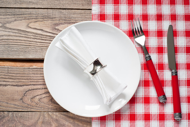 Table setting with a plate, cutlery and napkin - Photo, Image
