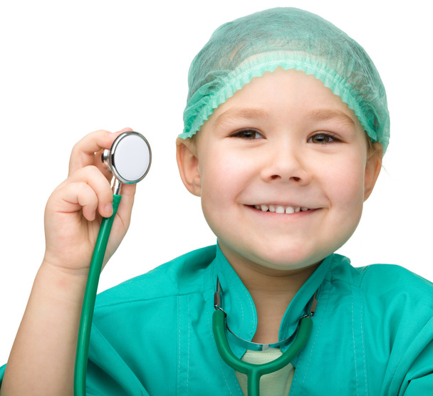 Маленькая девочка играет в доктора со стетоскопом
 - Фото, изображение