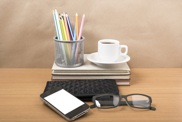 office desk : coffee with phone,stack of book,eyeglasses,wallet, - Foto, immagini