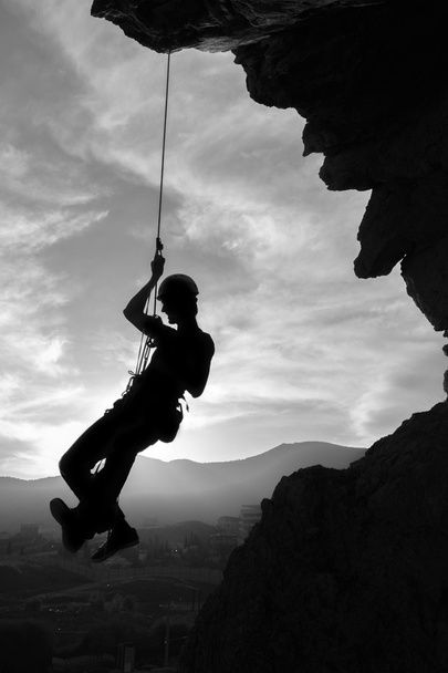 Silueta de un escalador - Foto, imagen