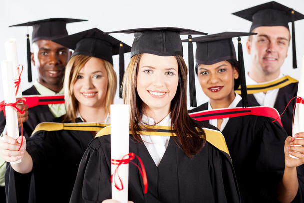 Group of graduates in graduation gown and cap - Φωτογραφία, εικόνα