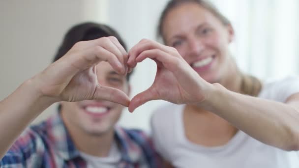 couple  making a heart with hands - Video, Çekim