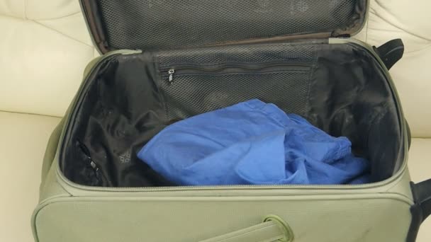 Suitcase with clothing - Footage, Video