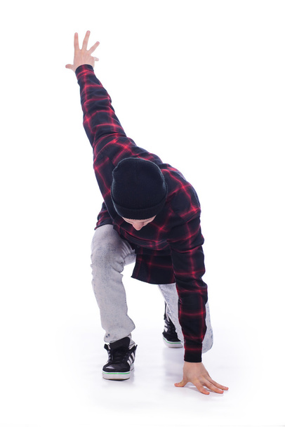 Hip hop dancer showing some movements (isolated on white) - Foto, imagen