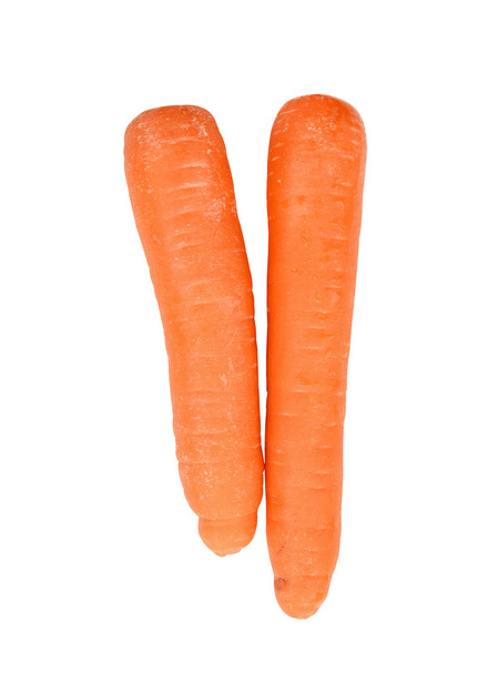 Carrots isolated on white background, clipping path included - 写真・画像