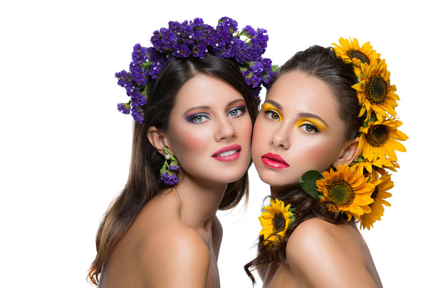 Two girls with flowers in hair - Photo, Image