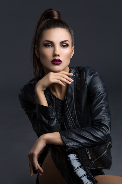 Girl in leather jacket and boots - Photo, Image