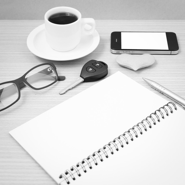 office desk : coffee and phone with car key,eyeglasses,notepad,h - Foto, Imagen