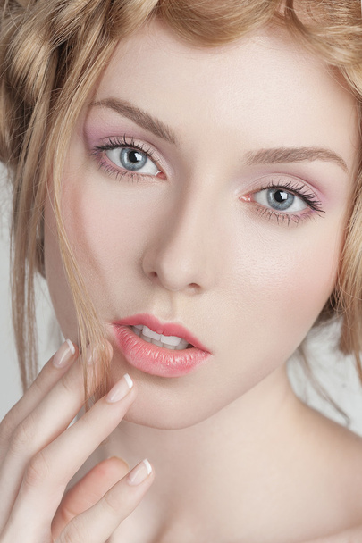 Portrait of beautiful woman with makeup and hairstyle - 写真・画像