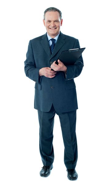 Corporate senior holding business documents - Фото, изображение