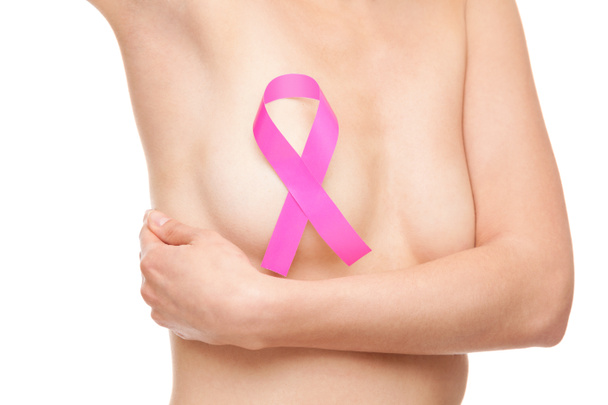 Woman with breast cancer awareness ribbon - Photo, Image