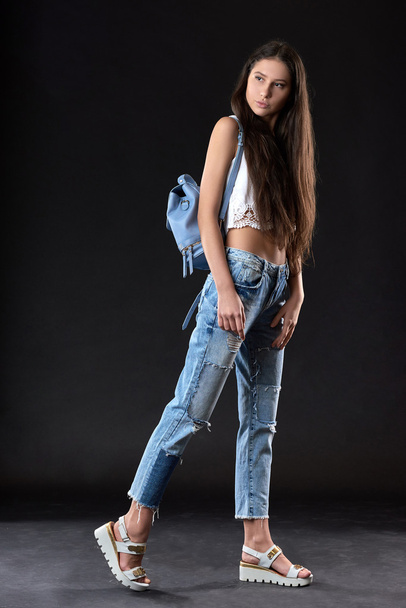 Fashion girl model posing in the studio - Foto, imagen