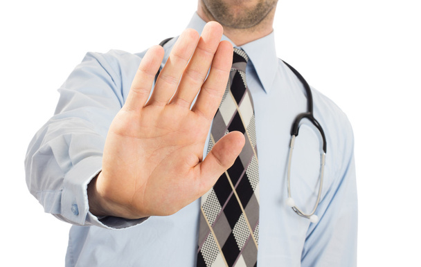 Médico masculino segurando a mão em um gesto de Parar ou Parar
 - Foto, Imagem
