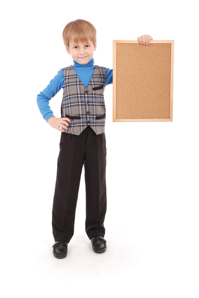 Chłopiec trzyma pewien deska wykonana z korka - Zdjęcie, obraz