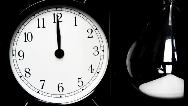 Alarm Clock, hourglass. The concept of time, different times - Footage, Video