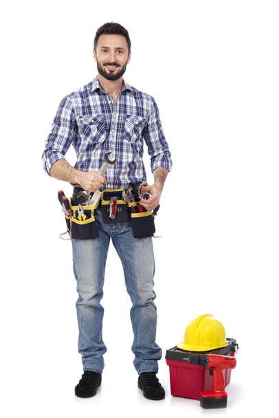 Trabajador de construcción con llave inglesa
 - Foto, imagen