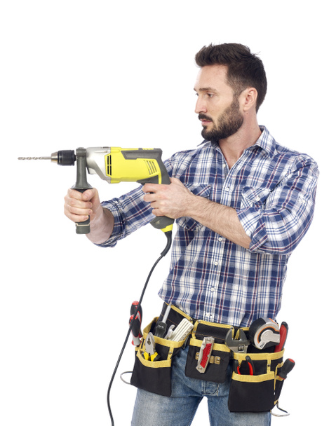 Handyman with drill - Fotoğraf, Görsel