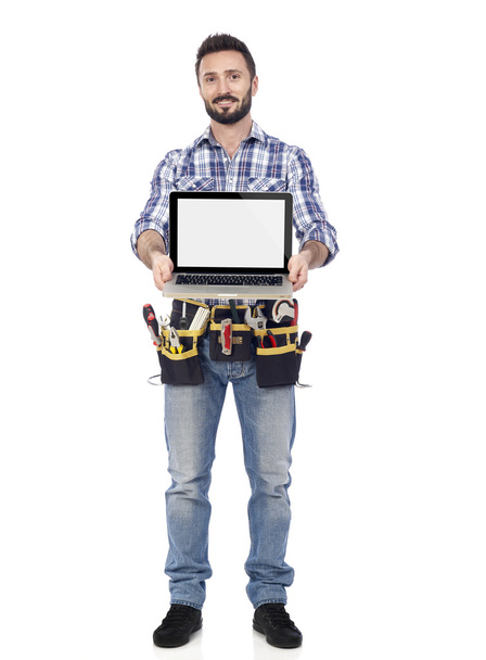 Carpenter showing laptop - Foto, Imagem