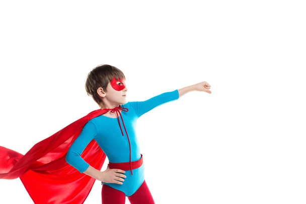 Boy playing a superhero isolated. - Foto, immagini