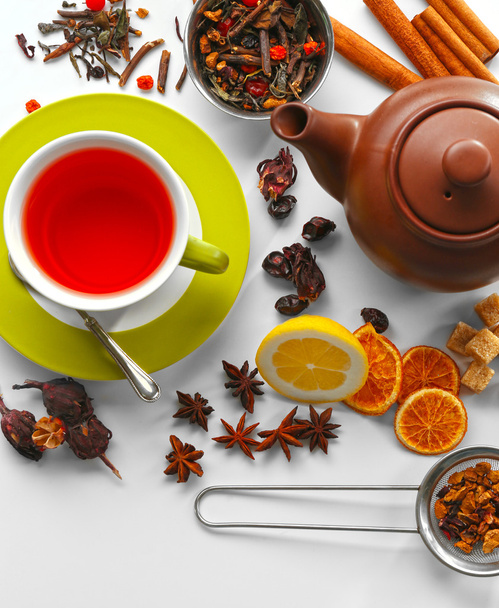 Cup of tea and delicious ingredients on table - Foto, Imagem