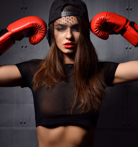 sexy woman with red Boxing Gloves at the gym concept about sport - Foto, immagini