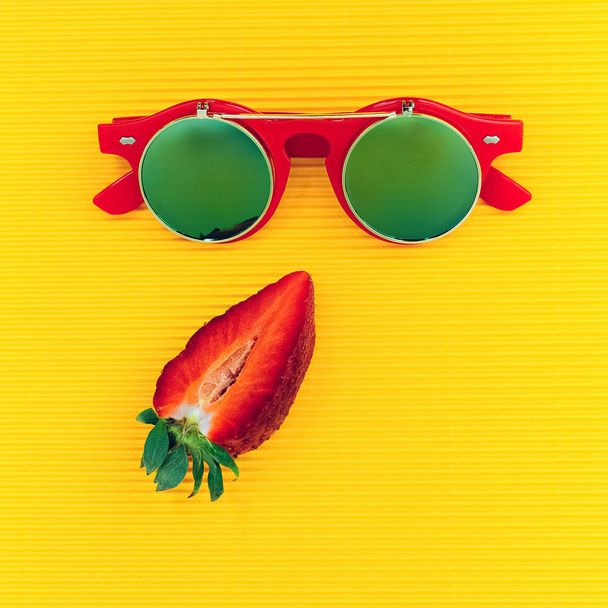 Steampunk sunglasses and strawberries. Fashion minimalism mix - Photo, Image