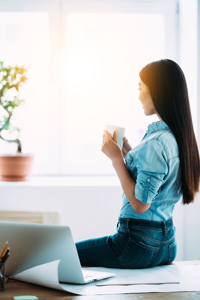 Asian woman with coffee cup - Фото, зображення