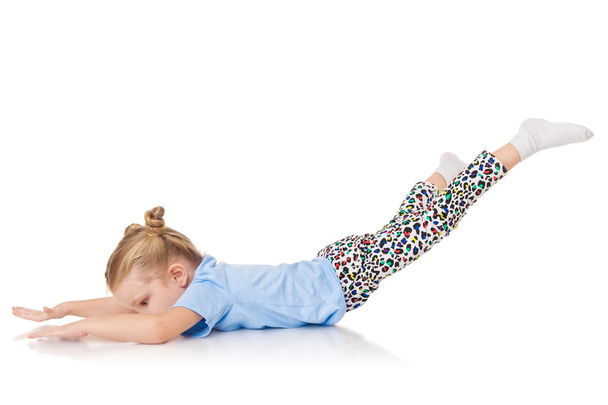 Little girl doing fitness exercises - Zdjęcie, obraz
