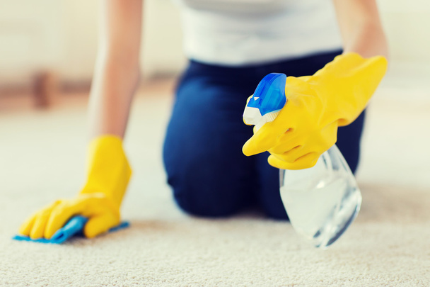 close up of woman with cloth cleaning carpet - Φωτογραφία, εικόνα