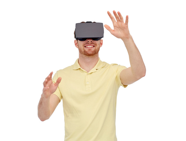 happy man in virtual reality headset or 3d glasses - 写真・画像