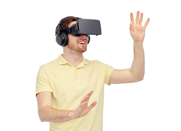 happy man in virtual reality headset or 3d glasses - Foto, imagen