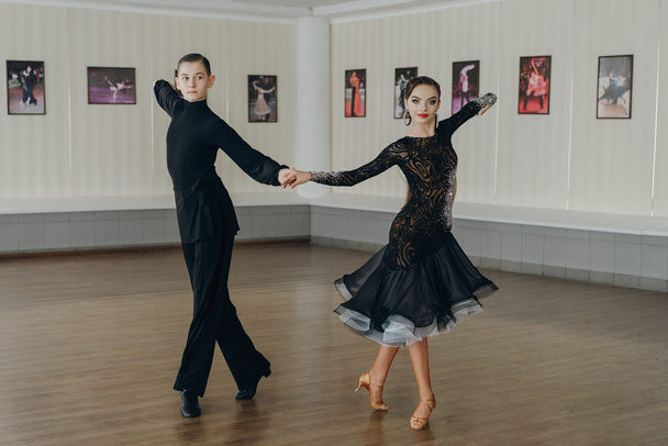Professional dancers dancing in ballroom. Latin. - Zdjęcie, obraz