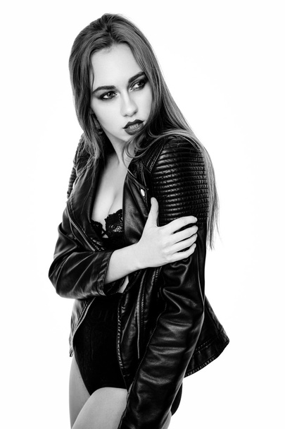 Woman in black leather jacket - 写真・画像