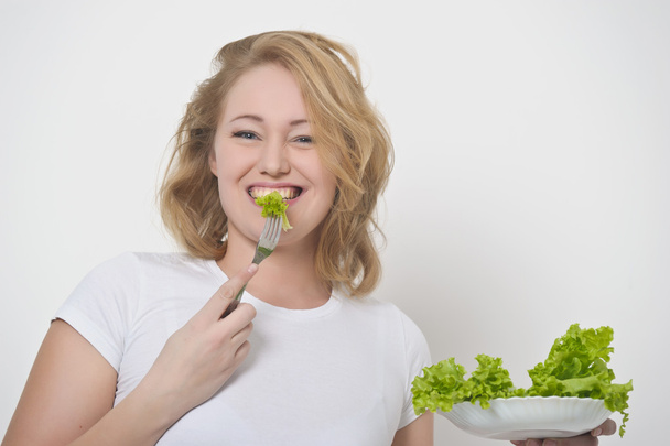 Girl and salad leafs - Foto, Imagen