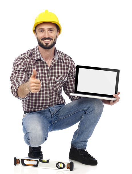 Carpenter with laptop - Photo, Image