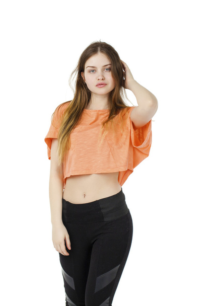 Hermosa rubia modelo de mujer de moda en blusa naranja
 - Foto, imagen