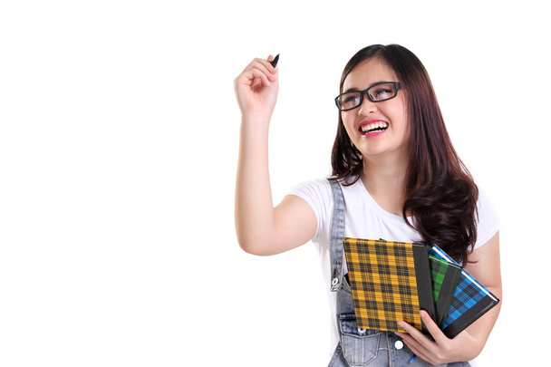 Щаслива шкільна дівчина, що пише на екрані ізольовано
 - Фото, зображення