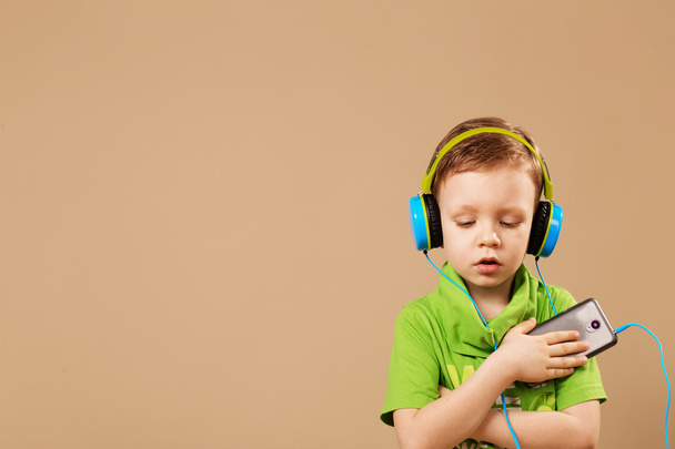 boy in the headphones enjoy music - Photo, Image