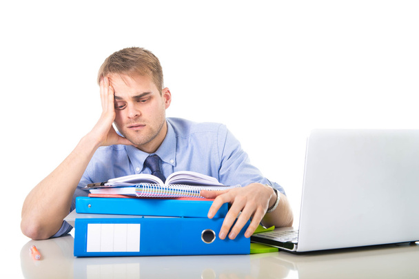 young overworked and overwhelmed businessman in stress leaning on office folder exhausted and depressed - Photo, Image