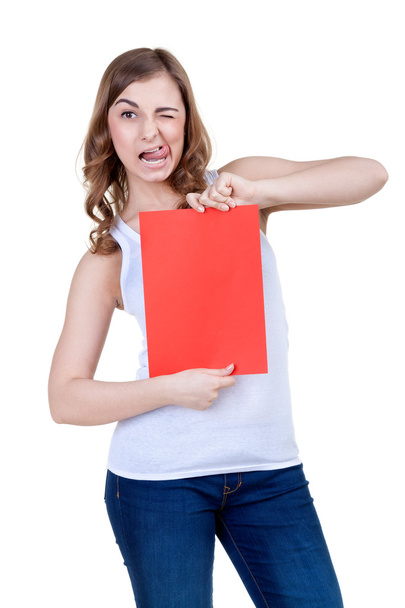 Beautiful girl with a red sheet of paper winks - Foto, afbeelding